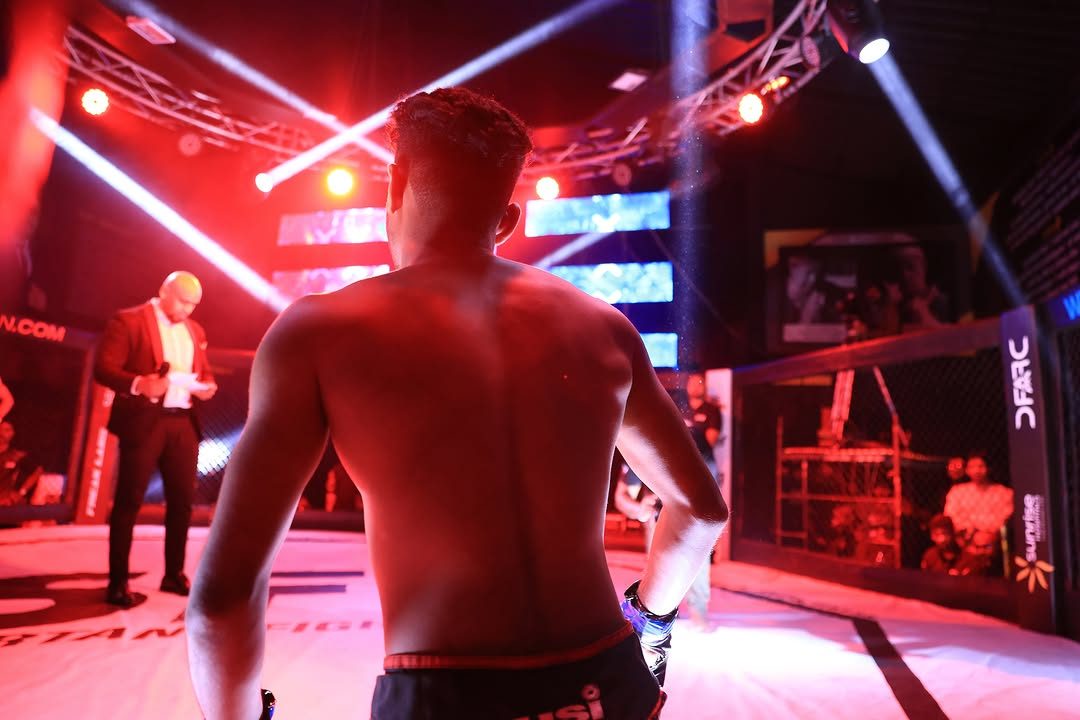 Valley MMA fighter in the cage at a Kerala fight night